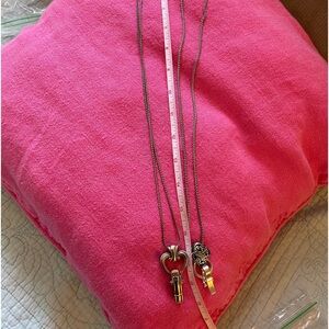 One Brighton lanyard, and one knock off Brighton lanyard